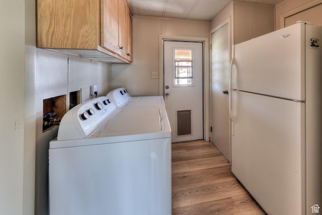 1281 Holyoak Ln E, Moab, UT 84532 - washroom with washer and dryer and light wood-style flooring