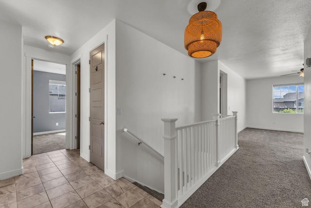 773 W Mulberry St, Stansbury Park, UT 84074 - hall with an upstairs landing and light colored carpet