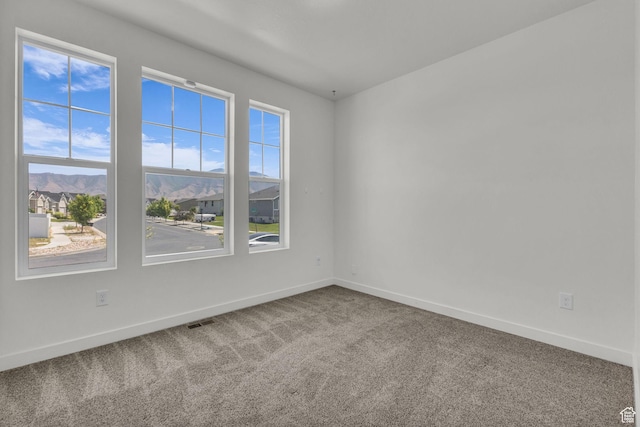 773 W Mulberry St, Stansbury Park, UT 84074 - unfurnished room with carpet flooring and baseboards