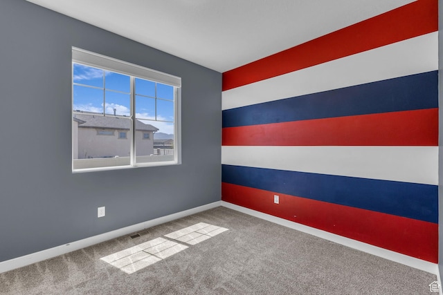 773 W Mulberry St, Stansbury Park, UT 84074 - spare room featuring carpet floors and baseboards