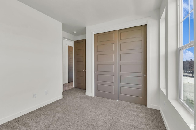 773 W Mulberry St, Stansbury Park, UT 84074 - unfurnished bedroom with carpet and a closet