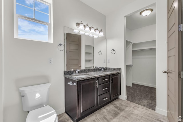 773 W Mulberry St, Stansbury Park, UT 84074 - bathroom with double vanity and a spacious closet
