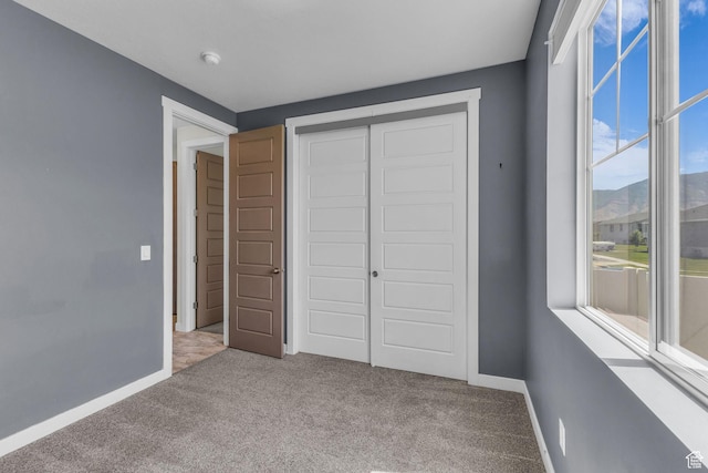 773 W Mulberry St, Stansbury Park, UT 84074 - unfurnished bedroom with carpet flooring and a closet