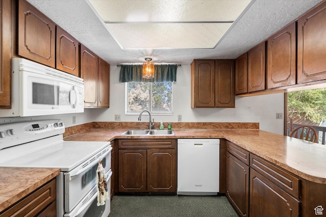 5374 S 5700 W, Hooper, UT 84315 - kitchen featuring white appliances, a peninsula, a textured ceiling, plenty of natural light, and light countertops