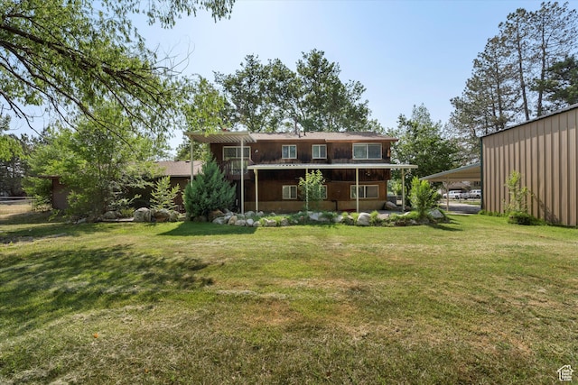 5374 S 5700 W, Hooper, UT 84315 - rear view of property featuring a lawn and an attached carport