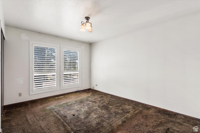 5374 S 5700 W, Hooper, UT 84315 - spare room featuring carpet flooring and a chandelier