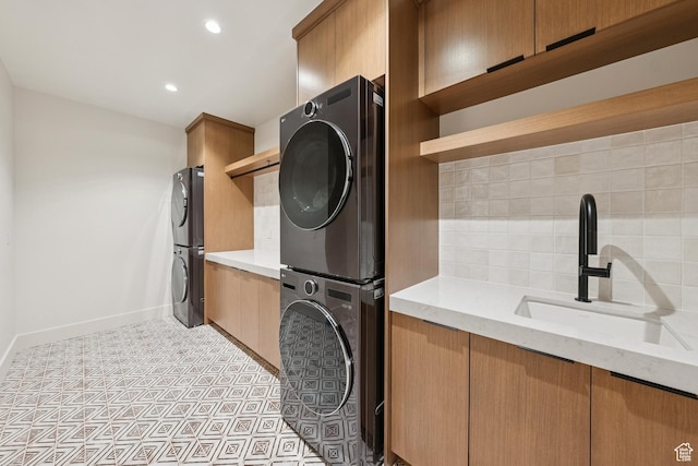 1404 W Ursa Way, Heber City, UT 84032 - washroom with stacked washing machine and dryer and recessed lighting