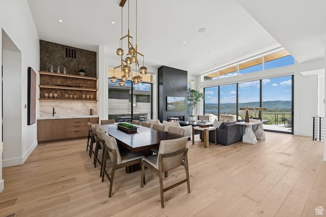 1404 W Ursa Way, Heber City, UT 84032 - dining area featuring light wood-style flooring and a chandelier