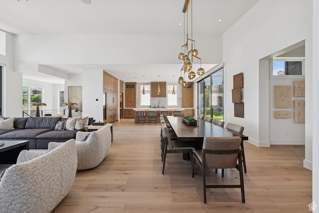 1404 W Ursa Way, Heber City, UT 84032 - dining area featuring light wood-style floors, recessed lighting, and a chandelier