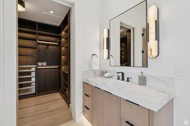 1404 W Ursa Way, Heber City, UT 84032 - bathroom with vanity, wood finished floors, and a walk in closet