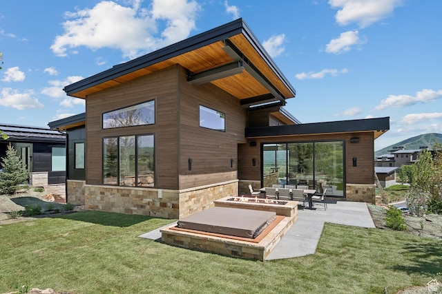 1404 W Ursa Way, Heber City, UT 84032 - back of property with stone siding, a patio area, and a yard
