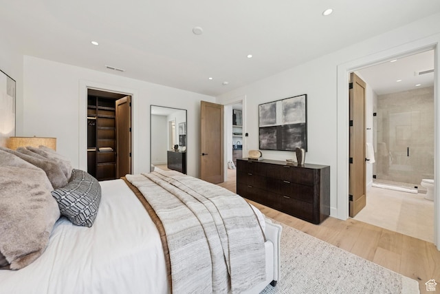 1404 W Ursa Way, Heber City, UT 84032 - bedroom featuring light wood-style floors, recessed lighting, a walk in closet, ensuite bathroom, and a closet