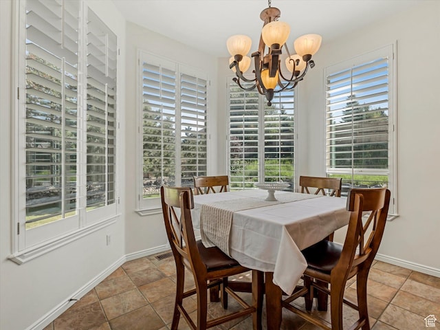 1639 E Lone Oak Dr, Draper, UT 84020 - dining area featuring a chandelier and stone finish floors