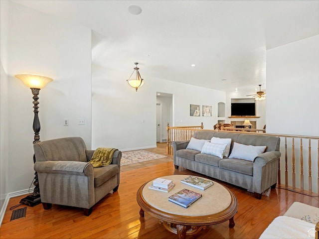 1639 E Lone Oak Dr, Draper, UT 84020 - living room featuring a ceiling fan and light wood-style flooring