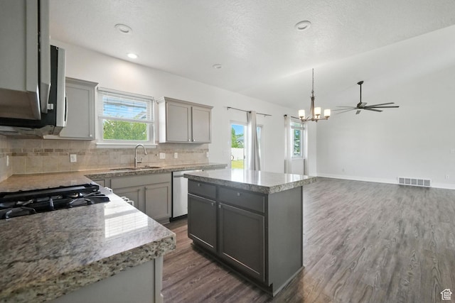 3707 S Panorama Dr, Saratoga Springs, UT 84045 - kitchen with gray cabinetry, dishwasher, dark wood-style floors, tasteful backsplash, and recessed lighting