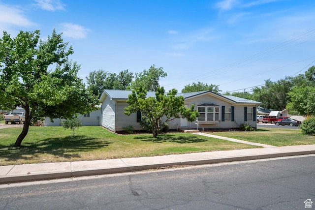 10 E 200 N, La Verkin, UT 84745 - view of front of house featuring a front lawn