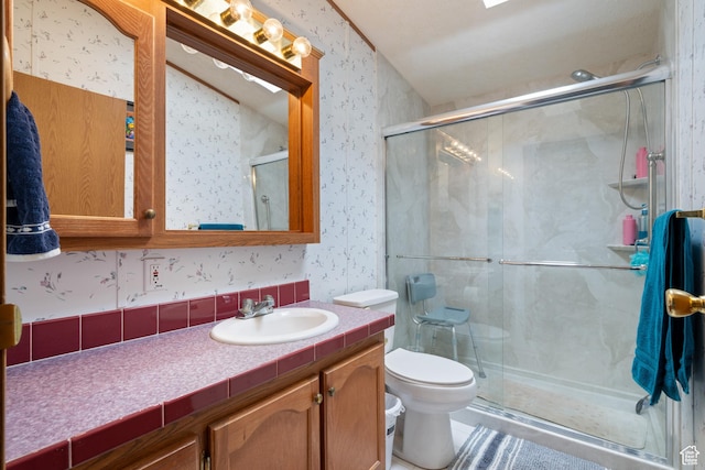 10 E 200 N, La Verkin, UT 84745 - bathroom with wallpapered walls, vanity, and a shower stall