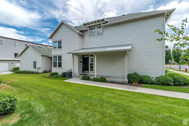 10363 S Silver Mine Rd, South Jordan, UT 84009 - view of front facade featuring a front yard, a standing seam roof, a metal roof, and a shingled roof