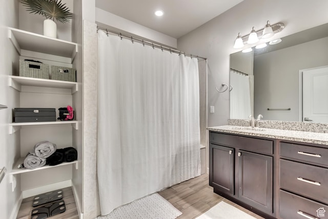 10363 S Silver Mine Rd, South Jordan, UT 84009 - bathroom featuring wood finished floors, vanity, a shower with shower curtain, and recessed lighting