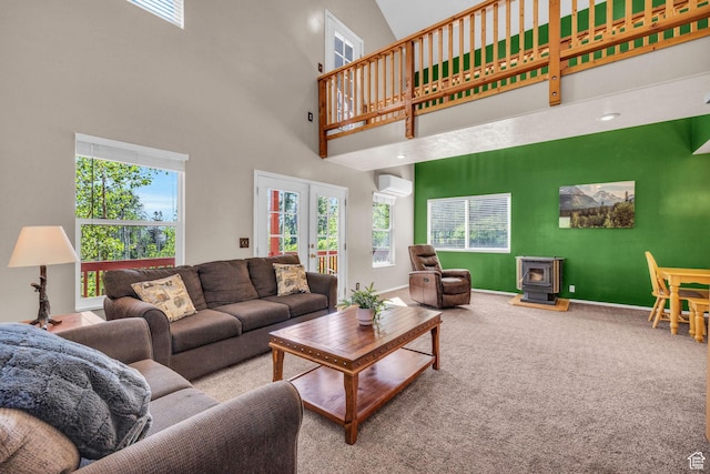 1624 Pine Cone Cir, Coalville, UT 84017 - carpeted living area featuring a wood stove, an AC wall unit, a towering ceiling, and french doors