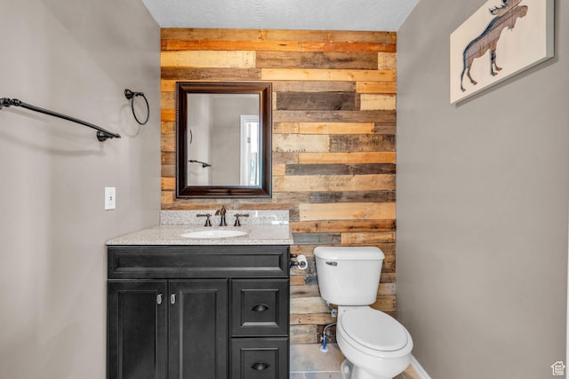 1624 Pine Cone Cir, Coalville, UT 84017 - bathroom featuring wood walls and vanity