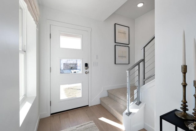 924 W Coalburn Way Unit 8-26, Murray, UT 84123 - foyer entrance featuring stairs and wood finished floors