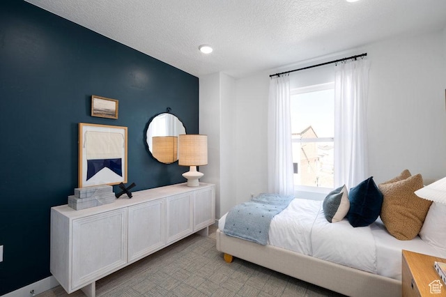 924 W Coalburn Way Unit 8-26, Murray, UT 84123 - bedroom with a textured ceiling and baseboards
