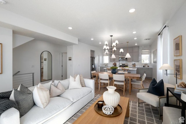 924 W Coalburn Way Unit 8-26, Murray, UT 84123 - living room with wood finished floors, recessed lighting, and a chandelier