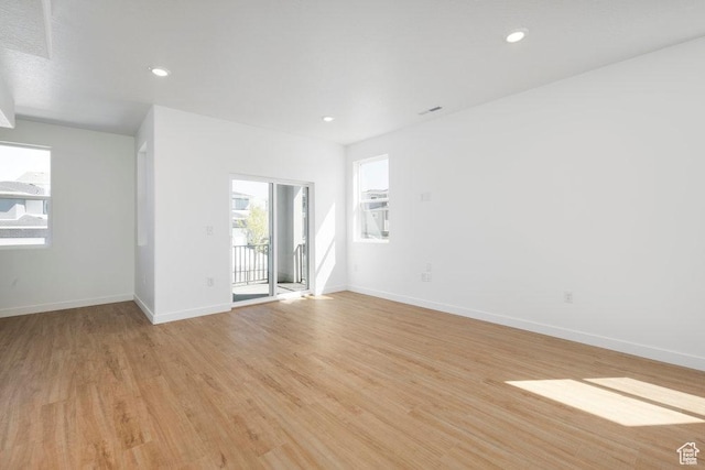 924 W Coalburn Way Unit 8-26, Murray, UT 84123 - spare room featuring light wood-type flooring and recessed lighting