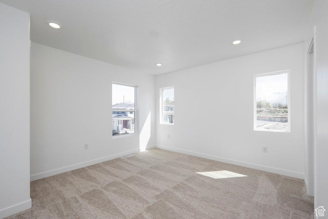 924 W Coalburn Way Unit 8-26, Murray, UT 84123 - spare room featuring light colored carpet and recessed lighting