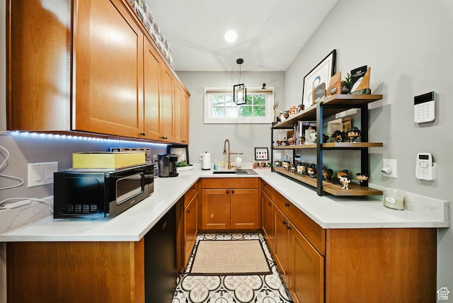 1734 E Spring Ln, Holladay, UT 84117 - kitchen with brown cabinetry, black microwave, and light countertops