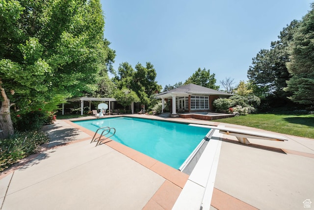 1734 E Spring Ln, Holladay, UT 84117 - outdoor pool with a diving board, a patio area, an exterior structure, and an outbuilding