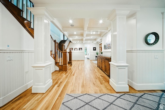1734 E Spring Ln, Holladay, UT 84117 - hallway featuring decorative columns, beam ceiling, light wood-style floors, stairs, and wainscoting