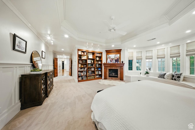 1734 E Spring Ln, Holladay, UT 84117 - bedroom with a tiled fireplace, ornamental molding, recessed lighting, light carpet, and a decorative wall