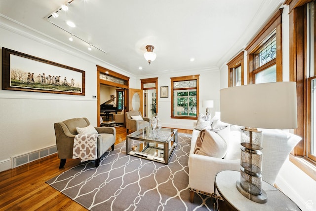 1734 E Spring Ln, Holladay, UT 84117 - living room with wood finished floors, ornamental molding, healthy amount of natural light, and rail lighting