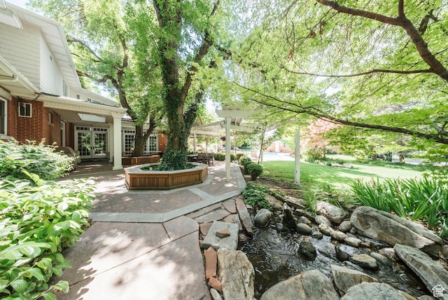1734 E Spring Ln, Holladay, UT 84117 - view of patio / terrace with french doors and a pergola