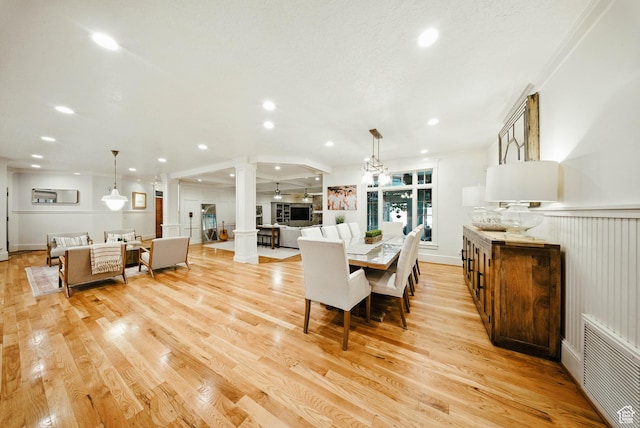 1734 E Spring Ln, Holladay, UT 84117 - dining area with ornate columns, recessed lighting, light wood-type flooring, and ornamental molding