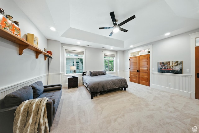 1734 E Spring Ln, Holladay, UT 84117 - bedroom featuring a raised ceiling, light carpet, recessed lighting, wainscoting, and a ceiling fan