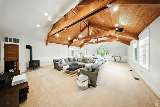 1734 E Spring Ln, Holladay, UT 84117 - living area featuring a wood stove, carpet floors, a wainscoted wall, recessed lighting, and wooden ceiling