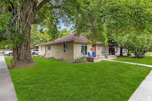 615 E 420 N, Provo, UT 84606 - single story home featuring a front yard and roof with shingles