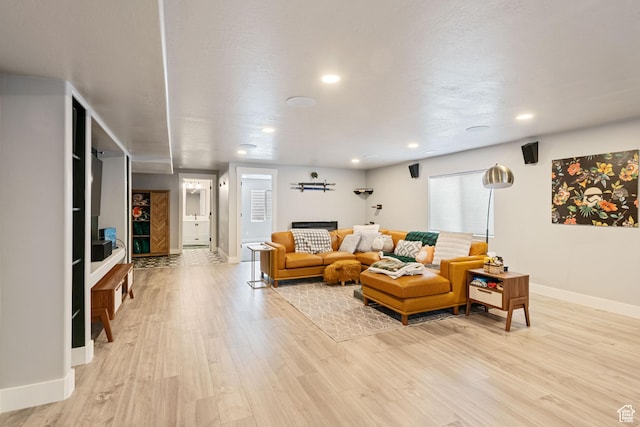 507 W 2030 N, Tooele, UT 84074 - living room featuring light wood finished floors and recessed lighting