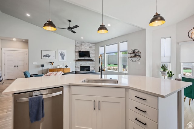 507 W 2030 N, Tooele, UT 84074 - kitchen featuring dishwasher, lofted ceiling, open floor plan, light countertops, and a ceiling fan