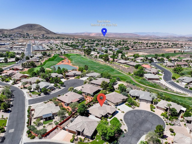 2469 W 840 N, Hurricane, UT 84737 - aerial perspective of suburban area with a local golf course and a water and mountain view
