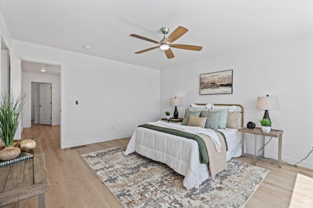 11568 S Watercourse Rd, South Jordan, UT 84009 - bedroom with wood finished floors and ceiling fan