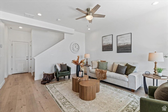 11568 S Watercourse Rd, South Jordan, UT 84009 - living area featuring light wood-style flooring, recessed lighting, ceiling fan, and stairs