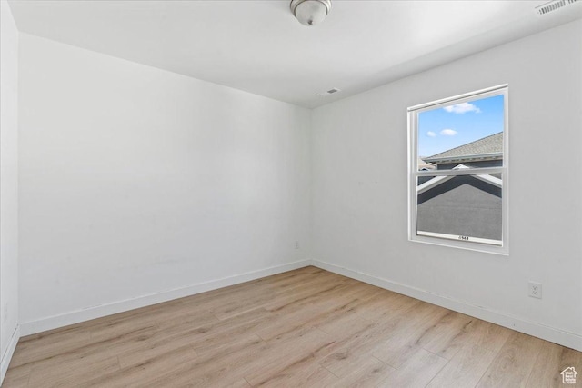 11568 S Watercourse Rd, South Jordan, UT 84009 - empty room with wood finished floors and baseboards