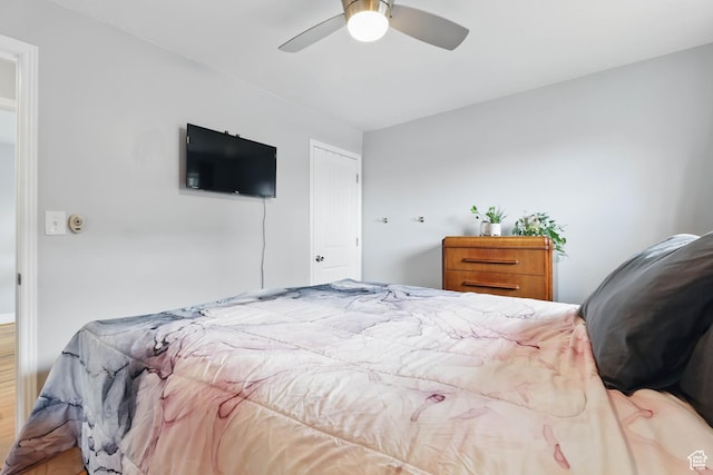 2645 S Masonic Cir E, South Salt Lake, UT 84115 - bedroom with wood finished floors and a ceiling fan