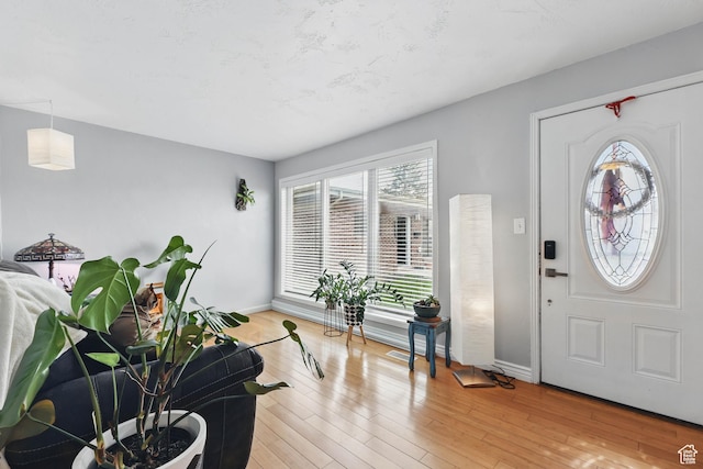 2645 S Masonic Cir E, South Salt Lake, UT 84115 - foyer featuring baseboards and light wood-style flooring