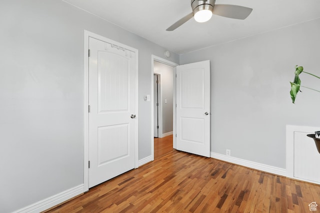 2645 S Masonic Cir E, South Salt Lake, UT 84115 - unfurnished bedroom featuring wood finished floors and a ceiling fan