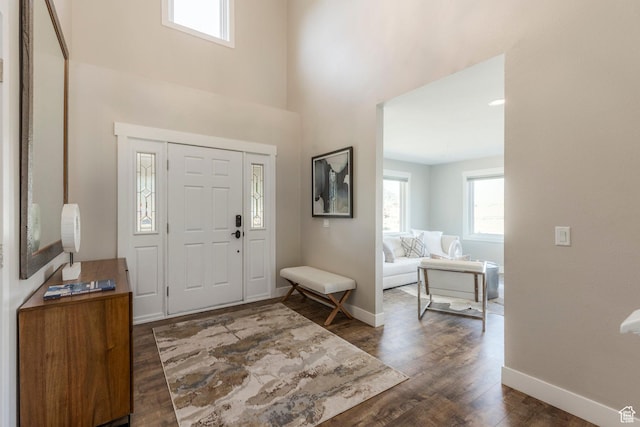 266 Old Ranch Rd W, Park City, UT 84098 - entrance foyer featuring dark wood finished floors and a towering ceiling